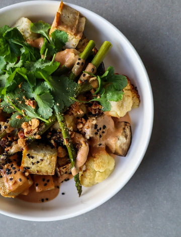Roasted Cauliflower, Aubergine and Tofu Traybake with Spicy Peanut Sauce