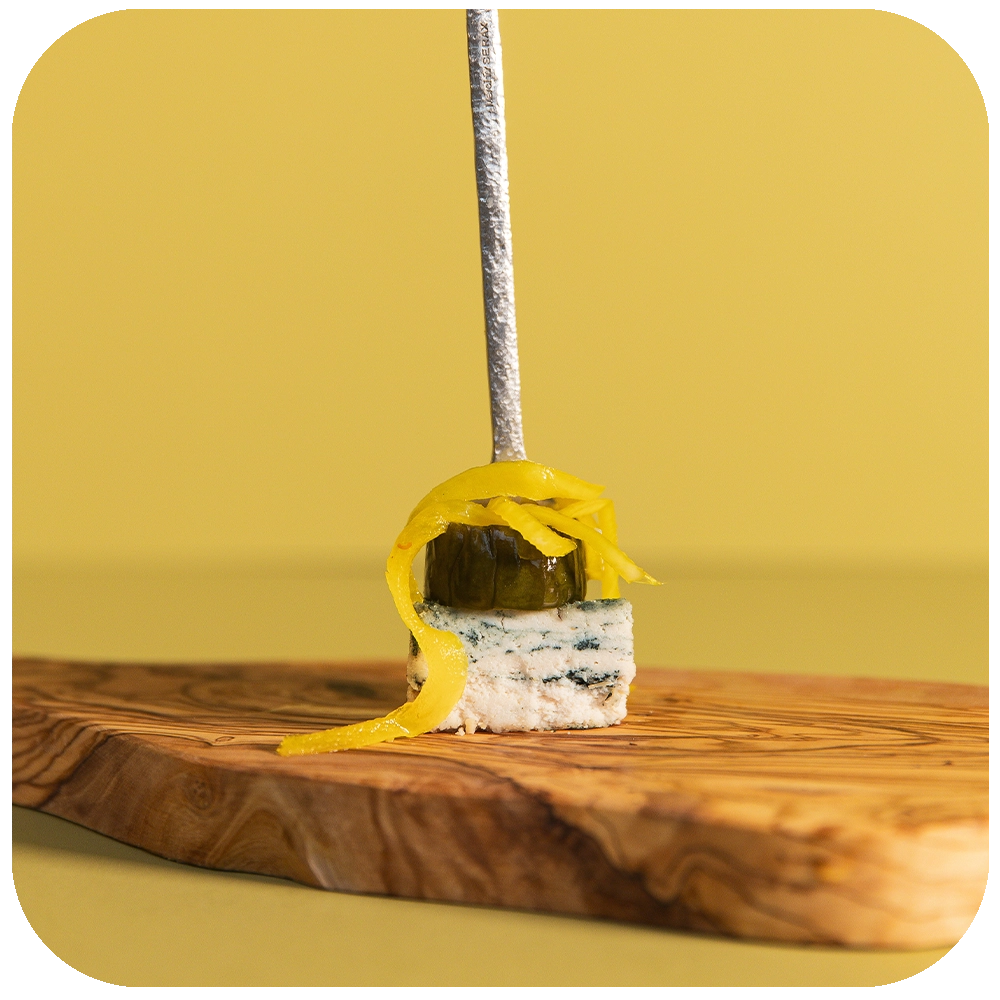 Perfect Pairings: Tangy Blue Cheese and Bread and Butter Pickles on a serving board 